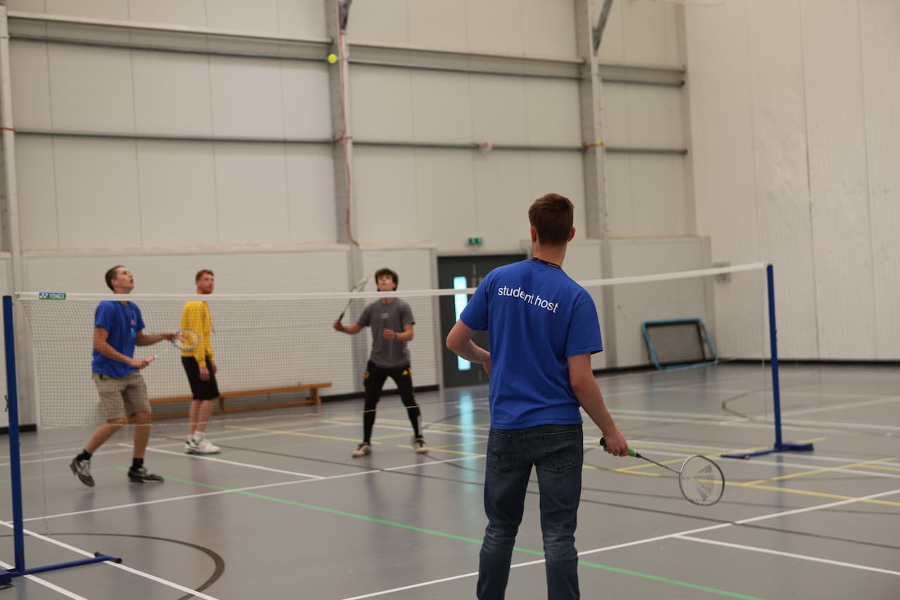 Student Host playing Badminton