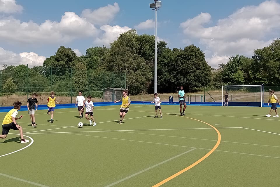 Football on all weather pitch